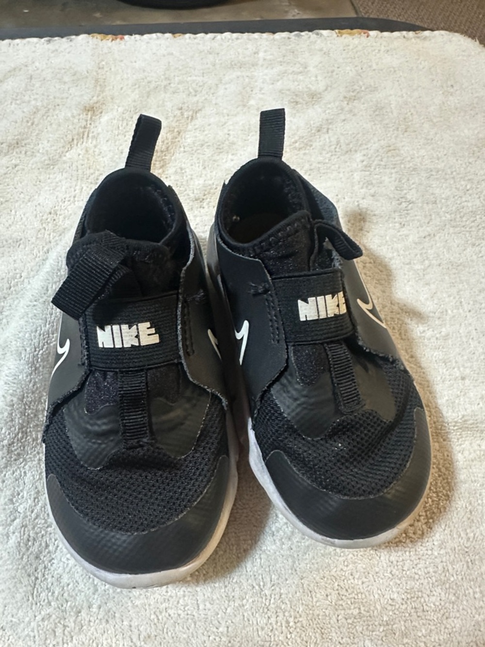 Nike Kids Black and White Slip-On Training Sneakers